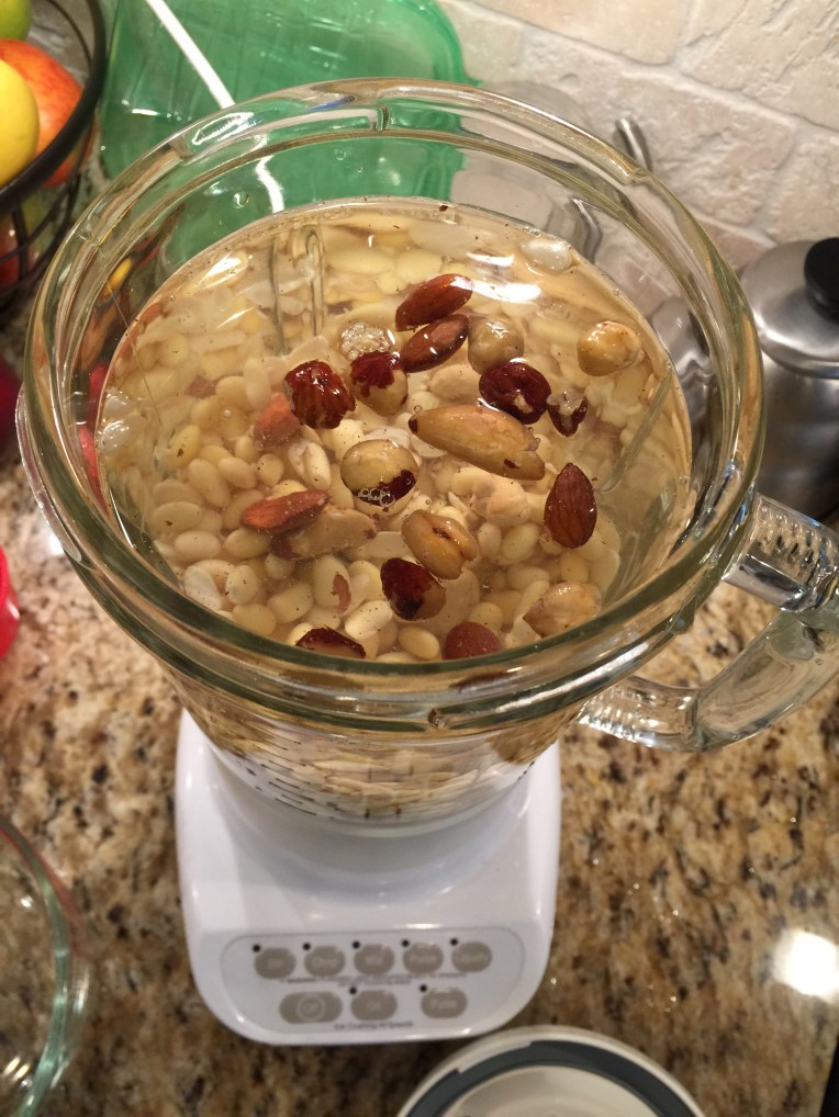 Add water (2 1/2 cups of water to 1 cup of cooked soybeans) and some ice then blend until smooth